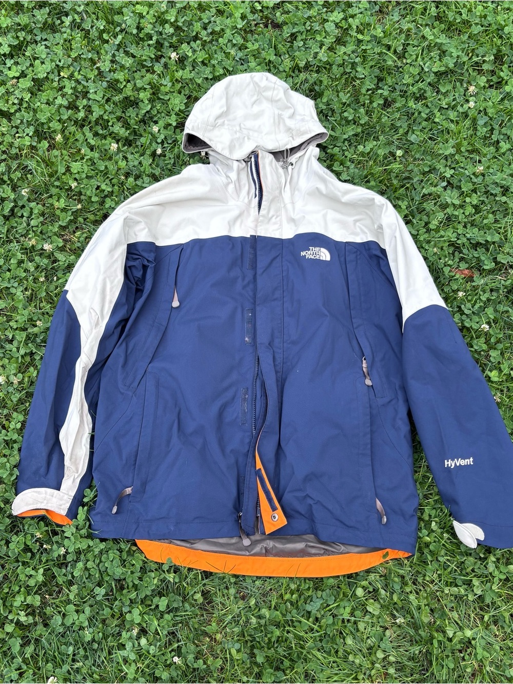 The North Face Navy and White HyVent Men’s Hooded Rain Jacket with Orange Trim